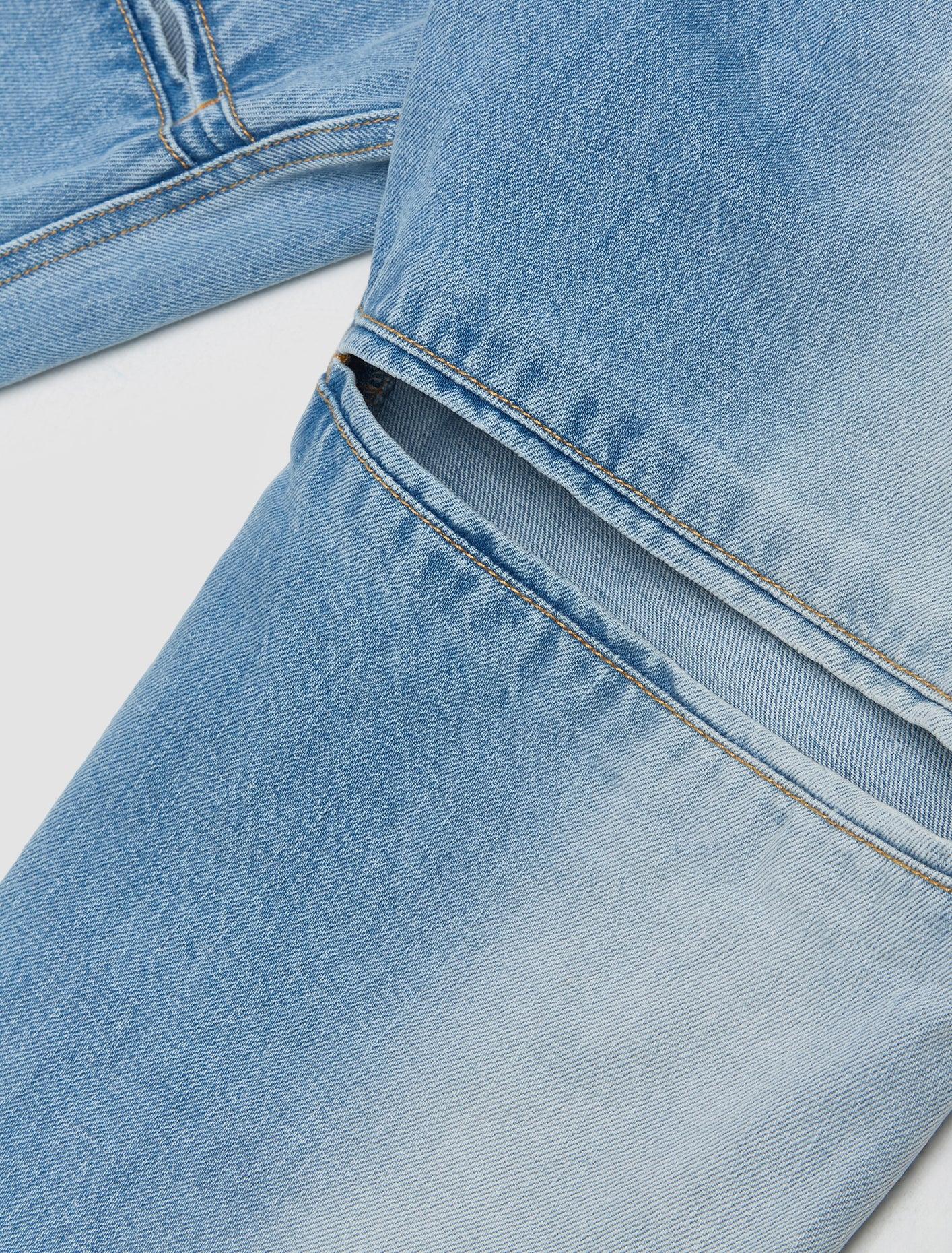 Woven Back Cut Denim Pants in Blue - Image 4